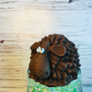 QUEST XO Sheepy Hot Cocoa Bomb: Brown colour sheep cocoa bomb on a wooden backdrop.